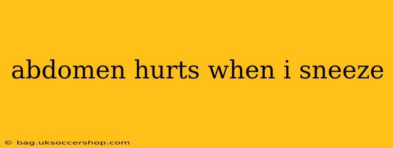 abdomen hurts when i sneeze