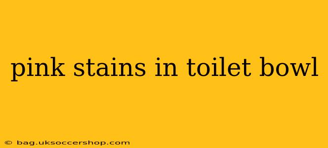 pink stains in toilet bowl